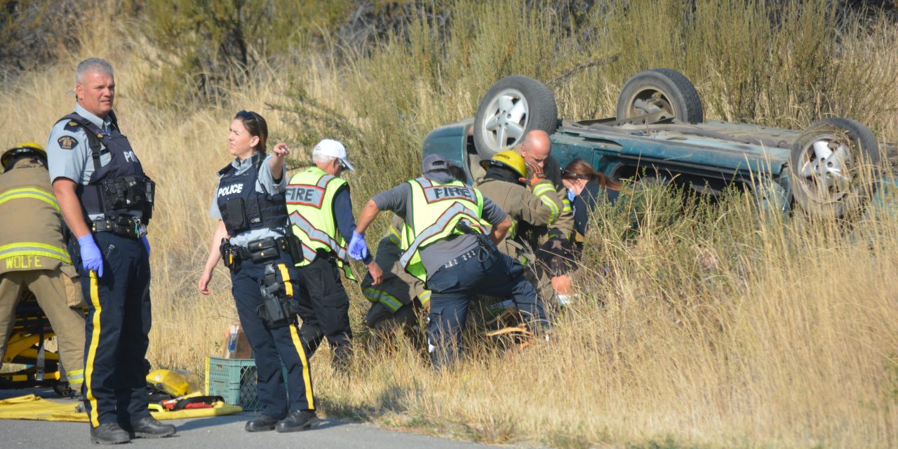 Vehicle occupants trapped in rollover
