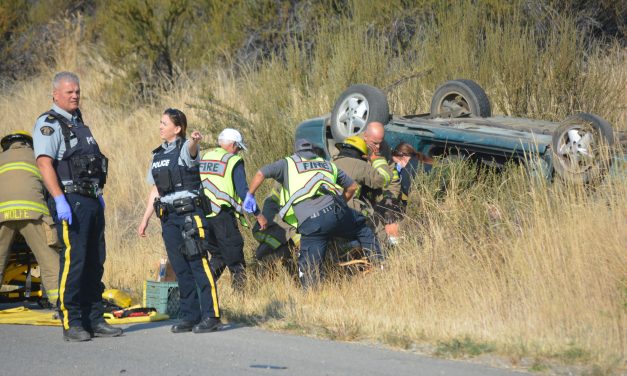 Vehicle occupants trapped in rollover