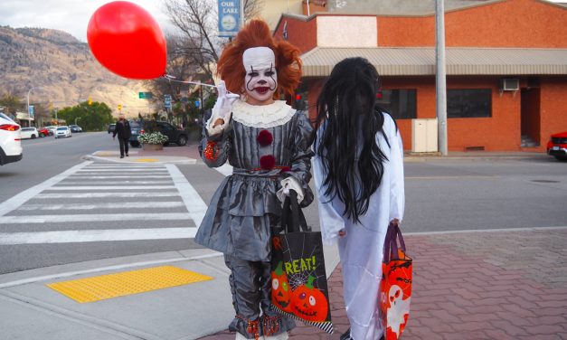 Costumed kids enjoy Trick or Treat Main Street
