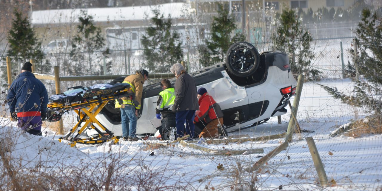 Woman injured in SUV rollover
