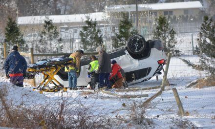 Woman injured in SUV rollover