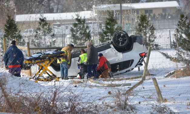Woman injured in SUV rollover