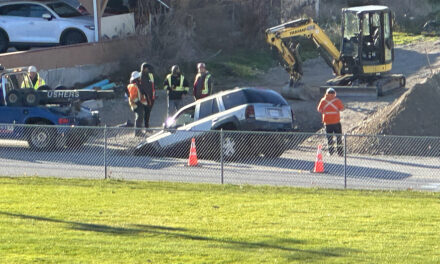 Driver disregards flaggers ends up in a hole