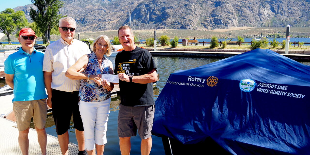 Rotary helps water quality society with new boat cover