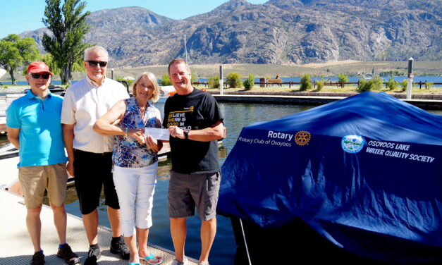 Rotary helps water quality society with new boat cover