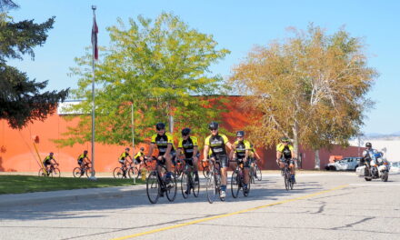 Lions donates $1k as Cops for Kids rolls through