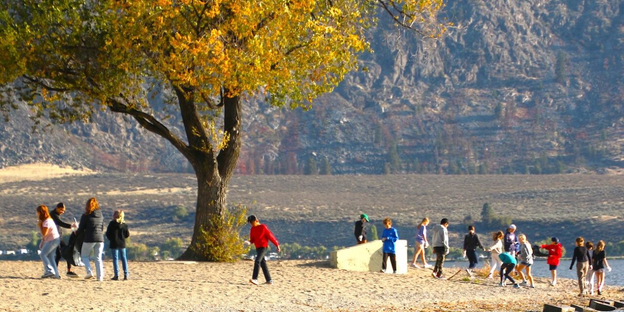 Elementary students clean up beach with water quality society