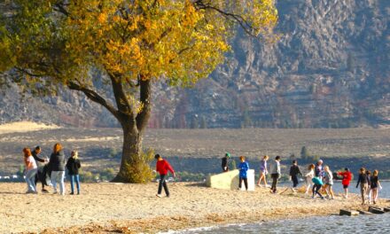 Elementary students clean up beach with water quality society