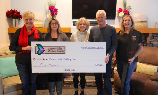 Hospice grateful for donation by Osoyoos paddlers