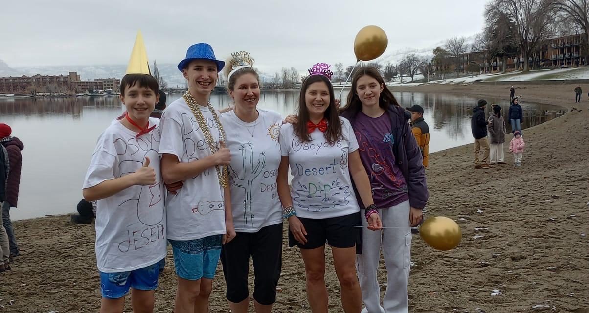 Daring ‘Desert Dippers’ take chilly New Year’s plunge