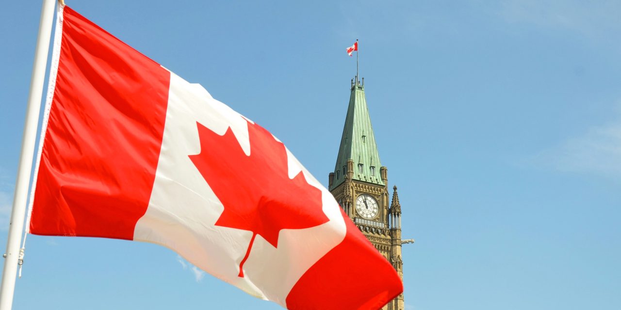 Five former PMs call on Canadians to fly the flag