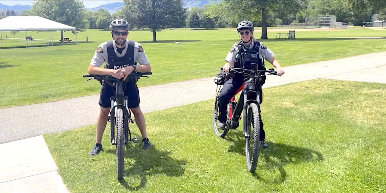 Oliver RCMP on bike patrol along Hike and Bike Trail